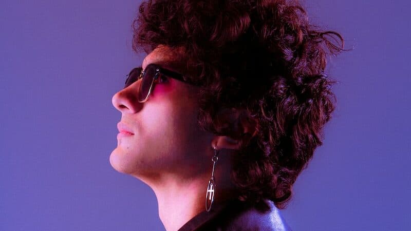 woman in black shirt wearing sunglasses